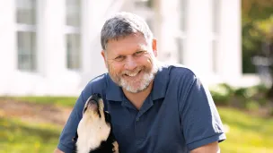 Portrait of Robert Drake, with dog.